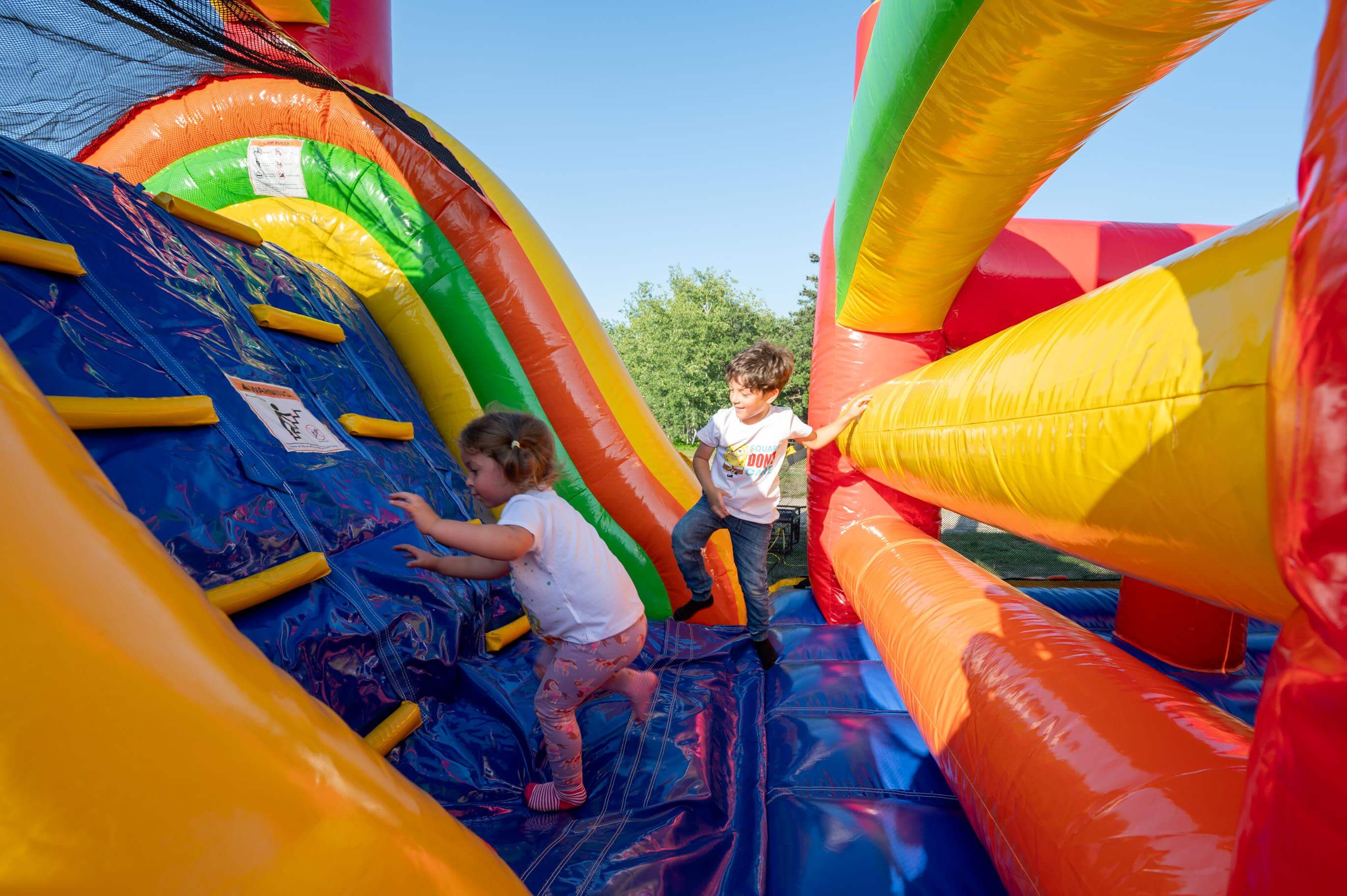 40' Rainbow Mega Obstacle Course Bouncy Castle party rentals Winnipeg Manitoba