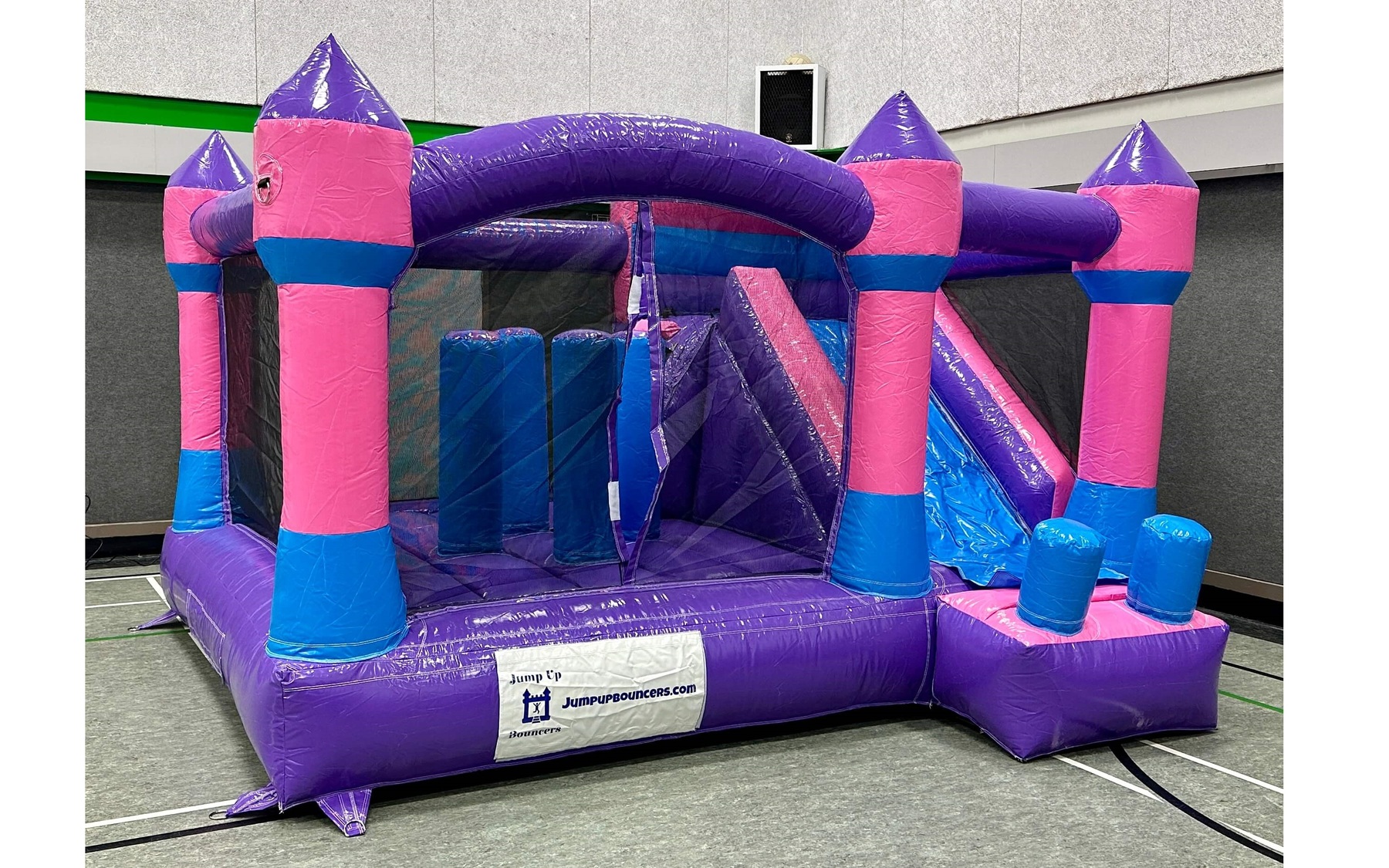 Jump&Slide Bouncy Castle Pink/Purple rentals Winnipeg Manitoba