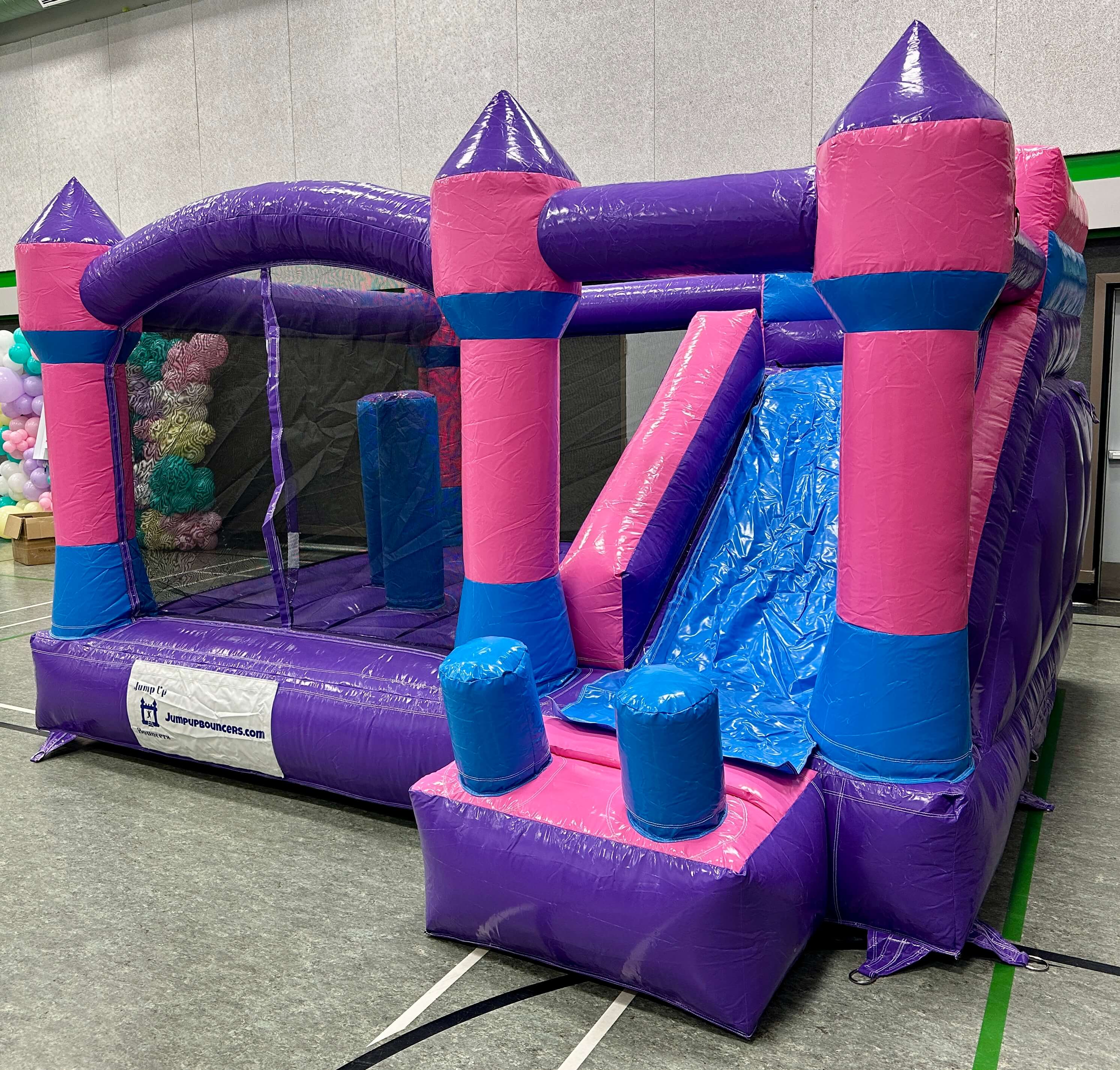 Jump&Slide Bouncy Castle Pink/Purple rentals Winnipeg Manitoba for rent